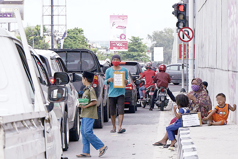 Marak di Lampu Merah, Dinsos Pekanbaru Imbau Masyarakat Tak Beri Uang ke Gepeng