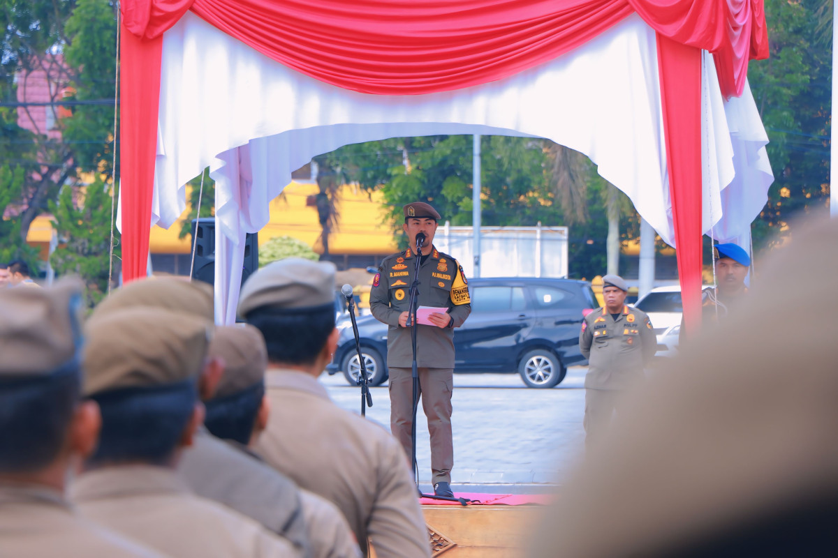 Pj Wali Kota Pekanbaru Sampaikan Pesan Penting pada Apel Besar Satpol PP Jelang Pilkada